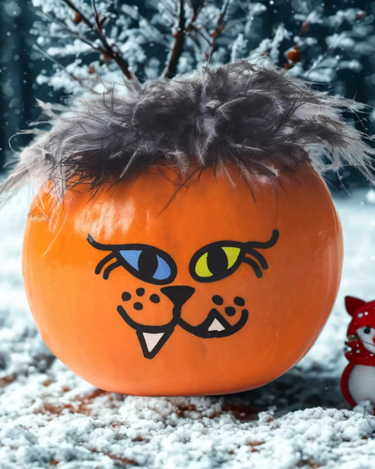 How to Transform Your Fall Pumpkins Into Charming Winter Centerpieces