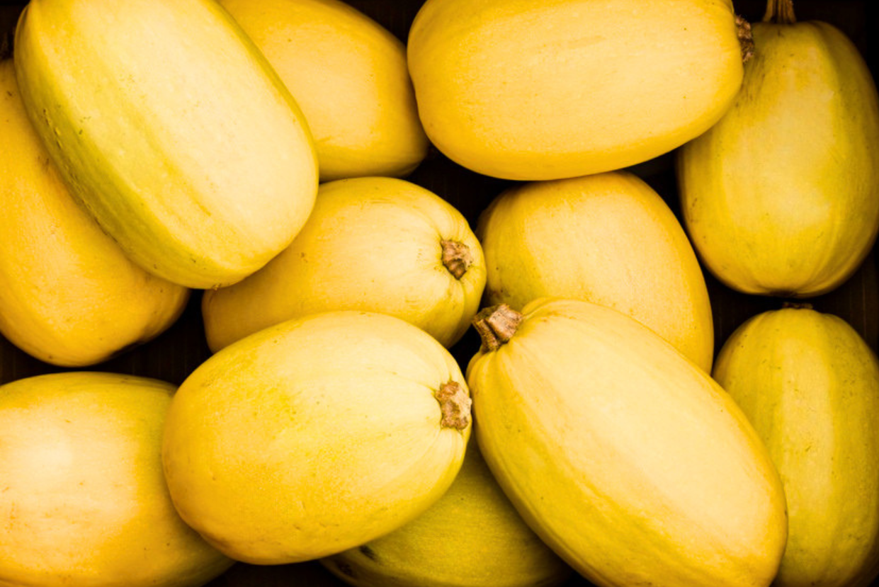 Box filled with yellow spaghetti squash