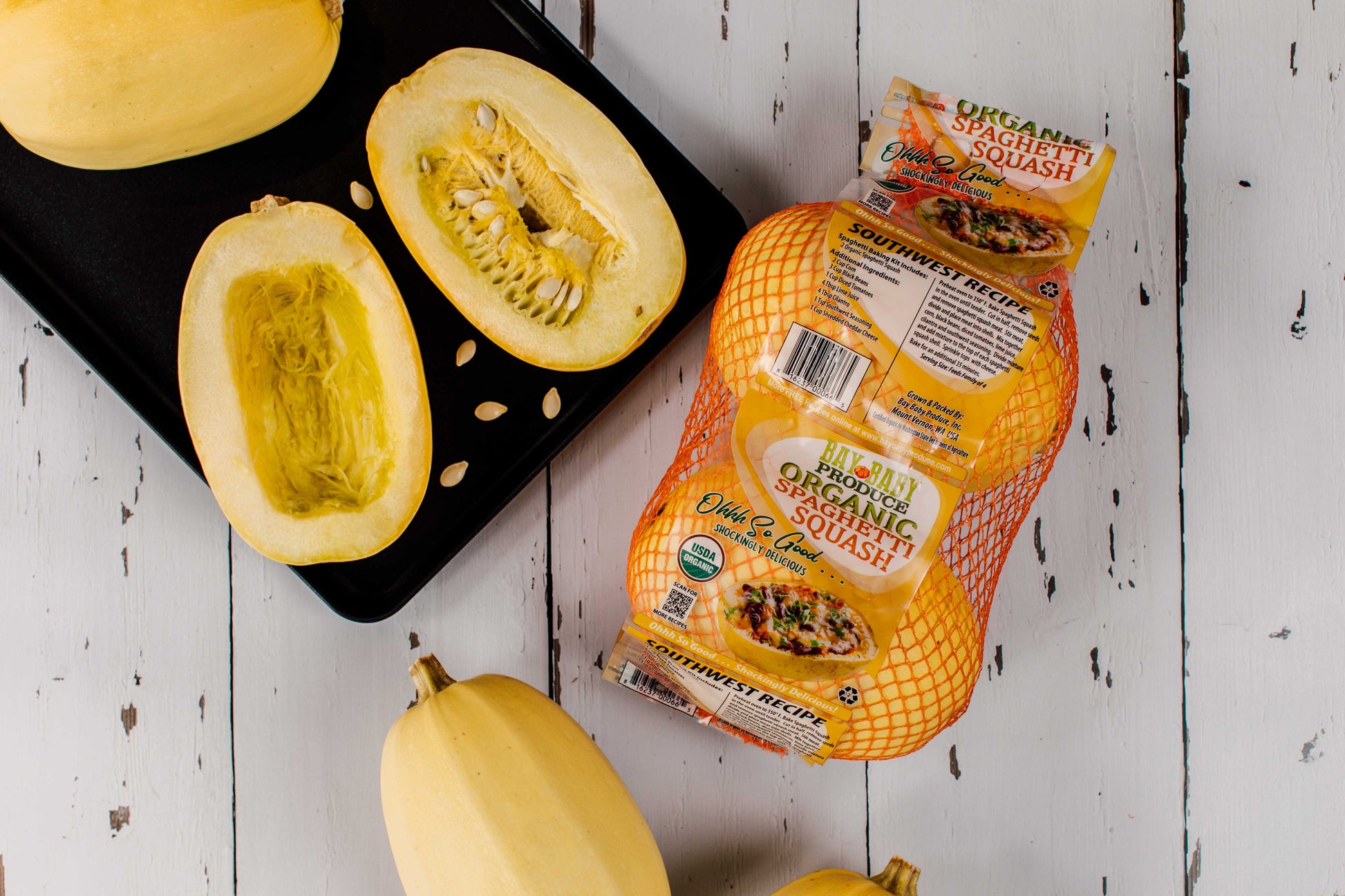 Spaghetti squash with packaging on a wooden surface